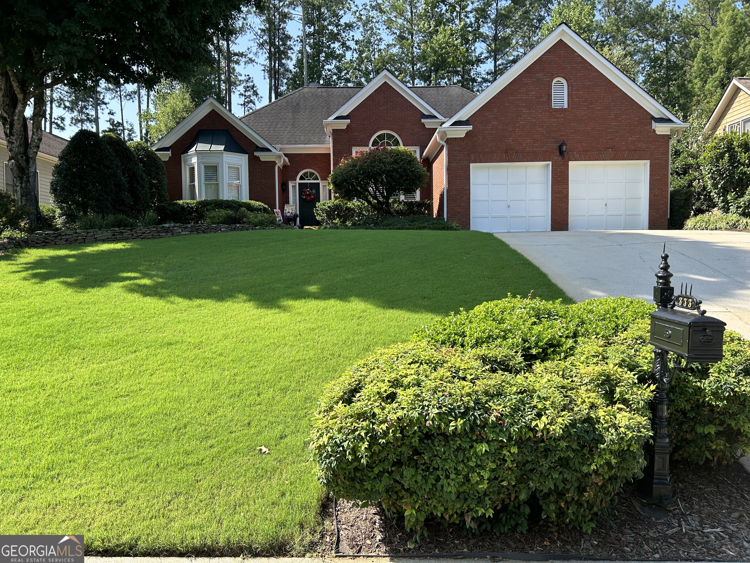 Perfect is an understatement! You'll fall in love the minute you stroll into this immaculate ranch! Kitchen features granite countertops and tile backsplash, new soft close cabinet doors and new drawer fronts with new hardware, & walk-in pantry. Architectural columns, curved archways, and wide plank hardwoods throughout home. Generous master featuring trey ceiling with door to 15' x 16' screened patio room with 2 velox roof windows and additional outdoor patio space for grilling. Remodeled master bath has tile & quartz double sinks, large shower and separate Jacuzzi tub, along with walk in closet with professional organization system. Kitchen breakfast area with door to screened patio room with views to "park-like" backyard. All windows have custom made Plantation Shutters. Brick front with 3 sides hardiplank siding with 50 year color plus paint. Brand new HVAC system installed 1/22/2025. Newer Leaf Guard Gutter System and Whole House Generac Generator makes this home move in ready and worry free!