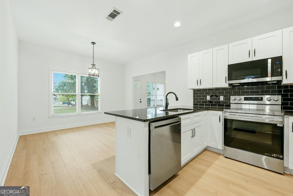 Photo of 2148 Wilson Avenue NW, Atlanta, GA 30314 (MLS # 10854222)