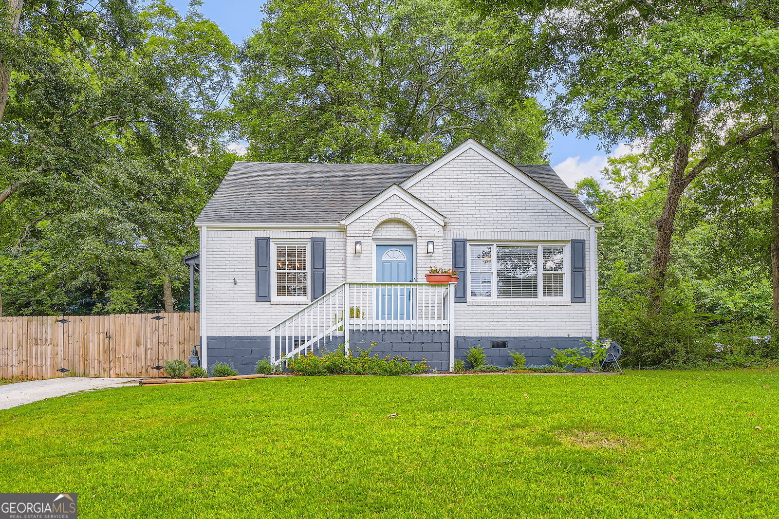 Welcome home to your picture-perfect bugalow perched on a charming grassy knoll! This spacious 3-bedroom, 2-bath gem offers bonus space and abundant storage. Previously renovated, this move-in ready home also includes recent updates: a new HVAC system in 2022, fresh paint and new carpet in June 2025. The open-concept kitchen features updated cabinetry, granite countertops, and stainless steel appliances -- ideal for everyday living and entertaining. The primary bedroom is conveniently located on the main level and connects to a large bonus/flex space perfect for a private office, oversized walk-in closet, nursery, or more. Enjoy a dedicated laundry room with built-in shelving and a full-size washer dryer. Upstairs,you will find an additional bedroom and versatile flex space with central air plus a powerful extra window/floor unit -- cool it down as much as you like! Step outside to a beautiful outdoor area complete with a charming patio strung with vintage lights and framed by lovely planters. All of this leads to a huge, fully fenced grassy yard -- perfect for entertaining, playing, or gardening. Dont miss the large 10x14 shed/workshop in excellent condition, equipped with shelving, wired for power, and featuring two ramps for easy access and tons of storage. A long driveway provides plenty of parking, including gated parking behind the fence for added privacy and security. Located in a prime area just steps from East Lake and Charlie Yates Golf Course, and minutes from the shops and restaurants in Kirkwood, East Atlanta Village, 2nd & Hosea, downtown Decatur, and more. Drew Charter School is also just around the corner. This is a truly special home you won't want to miss!