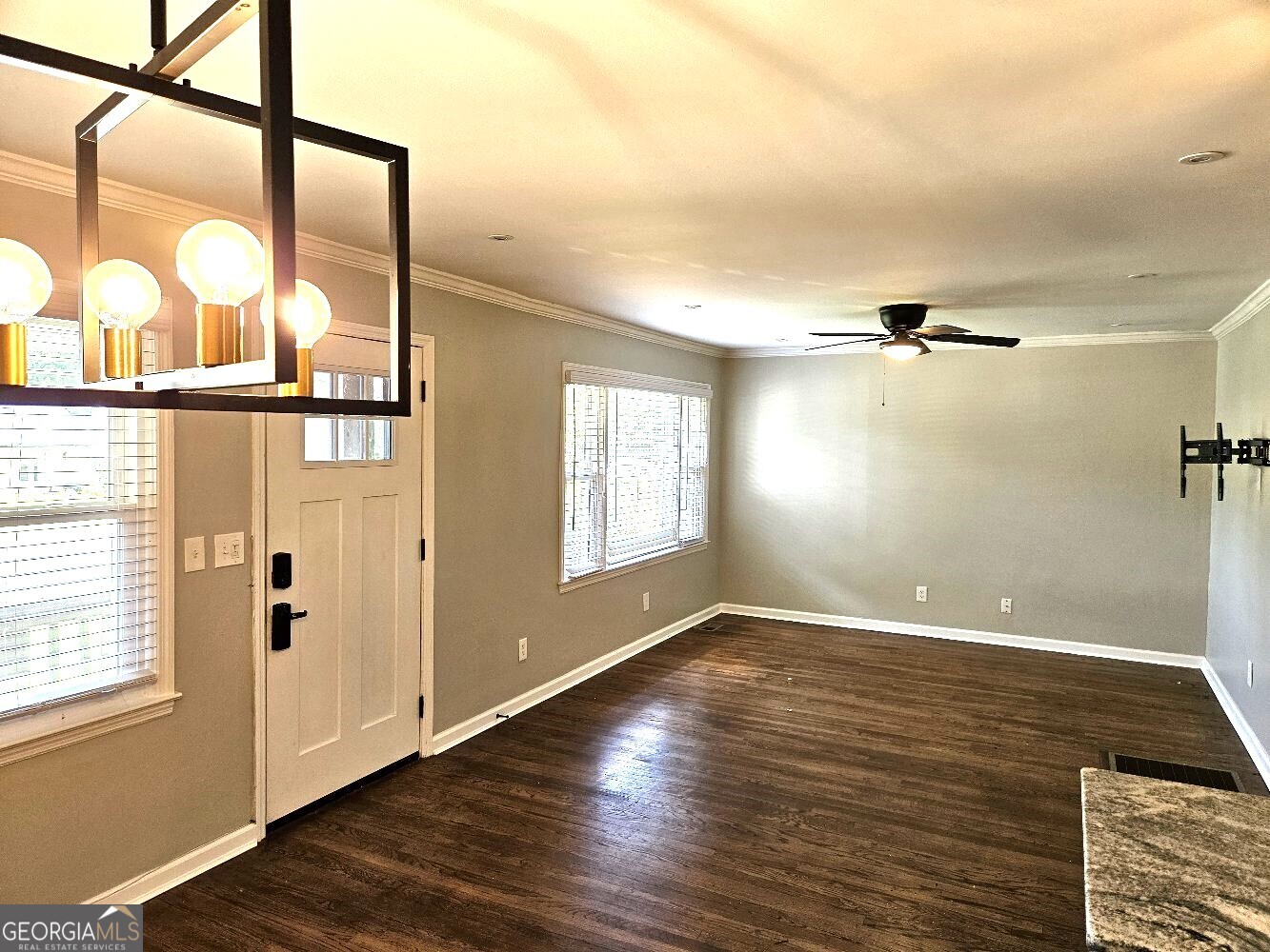 Looking to live in the city for a fraction of the price in a fantastic area minutes from the new Westside Park, the Gulch, downtown Atlanta, the Mercedez Benz stadium, retauransts, shops, MARTA...are you out of breath with all of the options yet? Look no further. This renovated 3 bedroom/2bath abode has granite countertops, decorative tile, fresh paint, stainless steel appliances, including a high end six burner range with a built-in pot faucet. Black iron lighting fixtures over the sink with center island & granite countertops. The primary bedroom/bath addition expands the living space. The original hardwoods were updated to retain the charm and character throughout. Not to mention the private fence for any backyard BBQ, family gathering, or just morning tea/coffee on the patio. An added bonus is the one-car garage w/ the laundry room attached that includes an almost new washer/dryer. Run! Don't walk! This beauty won't last!