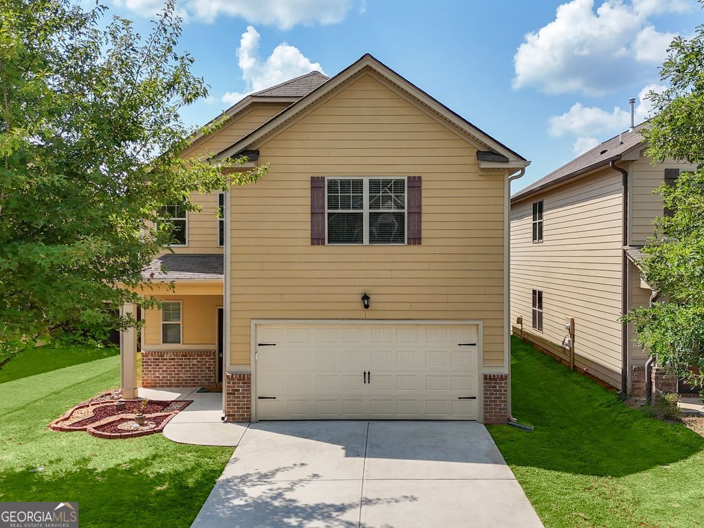 Welcome to this beautiful open-concept home featuring a modern kitchen with granite countertops, ample cabinet space, pantry, and stainless-steel appliances. The main level also offers a versatile bedroom perfect for guests or a home office. Upstairs, retreat to the huge master suite with trey ceilings, a luxurious ensuite bath with double sink vanity, soaking tub, separate shower, and a large walk-in closet. Three additional spacious bedrooms, a full hall bath, and a convenient laundry room complete the second floor. Enjoy resort-style living with neighborhood amenities including a gigantic pool, kids pool, tennis courts, basketball courts, and a playground. Conveniently located near I-75 and Atlanta Airport for an easy commute, with plenty of shopping and restaurants nearby. Sorry, no pets. Call or text to schedule your private viewing!