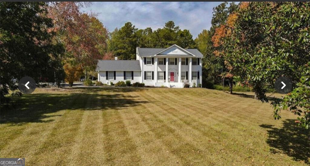 Photo of 2809 Highway 138, Jonesboro, GA 30236 (MLS # 10670017)