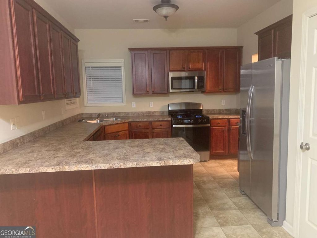 Photo of 2560 Freemont Street, Snellville, GA 30078 (MLS # 10658272)