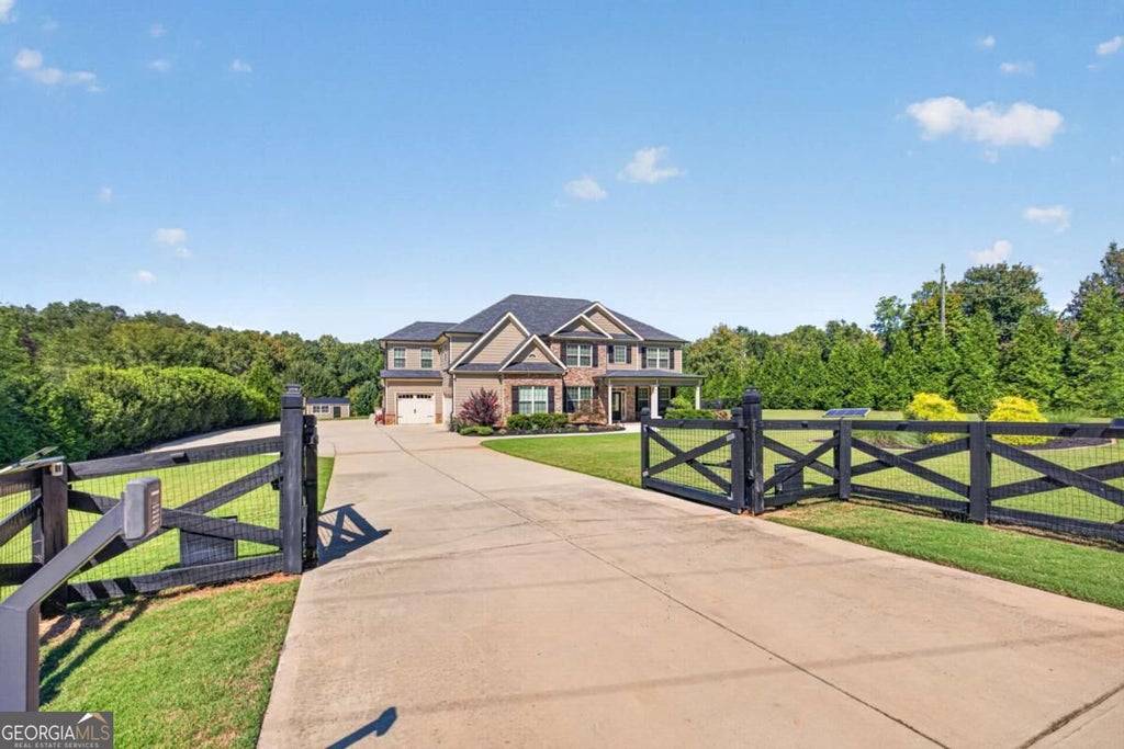 Photo of 415 Skelton Road, Hoschton, GA 30548 (MLS # 10848352)