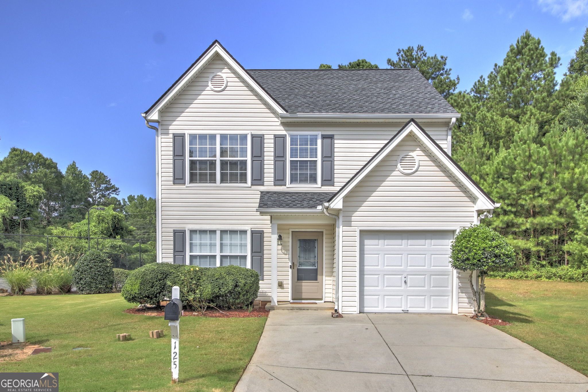 Welcome to your next home a beautifully maintained 4-bedroom, 2.5 bath gem nestled in a quiet and accessible Lawrenceville community. This home features an open floor plan ideal for both entertaining and everyday living. The kitchen flows seamlessly into the dining area and family room, where a cozy fireplace creates the perfect atmosphere for gathering. The main level bedroom offers flexibility perfect for guests or a private home office. Upstairs, you'll find a generous master suite with trey ceilings and a spa-inspired bathroom featuring a double vanity, separate soaking tub, and shower. Two additional oversized secondary bedrooms offer ample space each able to accommodate a king-sized bed and share a full bath. Enjoy the convenience of nearby Rose Jordan Park, local grocery stores, the post office, and the vibrant downtown Lawrenceville scene, known for its upscale dining and year-round events. Don't miss this opportunity to rent a stylish, functional home in one of Gwinnett County's most desirable areas! "Housing Vouchers, Ok!"