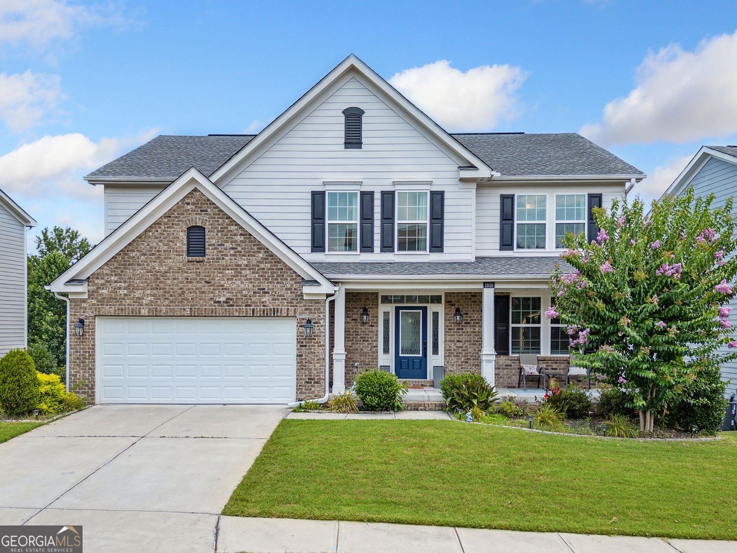 This is the one! Welcome to 1810 Primrose Park Rd-a well-maintained, one-owner home (with builder warranty still intact) in the heart of Sugar Hill. This 4-bed, 3.5-bath home offers flexible living with a formal dining room, private office, and a spacious naturally lit living room featuring an 85-inch mounted Sony TV with 7 in ceiling speakers, custom fireplace, dimmable lighting. The open-concept kitchen flows into a breakfast area and out to the deck-perfect for morning coffee or evening entertaining. Upstairs, the oversized primary suite impresses with a sitting area, two walk-in closets, a spa-like ensuite bath, and dimmable lighting to set the perfect tone of relaxation after a long day. The loft features natural and dimmable lighting for those cozy movie nights, and each secondary bedroom includes walk-in closets. A shared full bath offers double sinks for added convenience. The home also includes a laundry room with storage, gas appliances, and a walk-out unfinished basement with a finished full bathroom-ready for your custom touch. With smart features, generous space, and a location close to top schools, shopping, and dining-this one is a must-see.