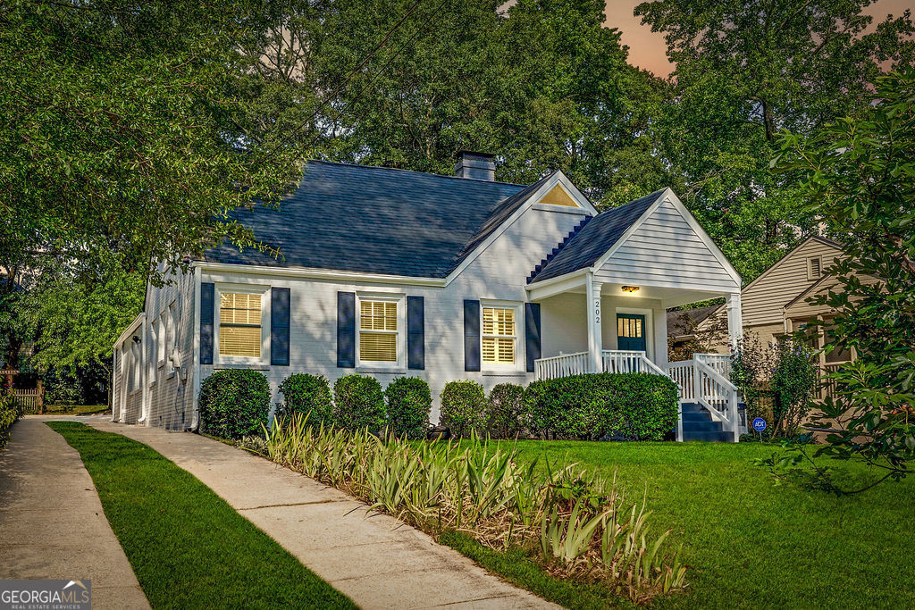 This is a wonderful updated 5BR/3BA home in one of the most desirable neighborhoods in Decatur. It is on a sleepy cul de sac like road with annual parties, and kids routinely playing in the streets. A truly special pocket of Winnona Park that is walkable to COD schools with a thriving and active community. The house is warm and inviting with a rocking chair front porch. It has been newly painted throughout with original hardwood floors on the main level, a well designed kitchen with custom cabinetry and a bar area, master on the main with tiled separate shower, and a dining room that flows to the kitchen and screened in porch. The owners use one of the bedrooms as a dedicated office. The upstairs is a converted attic area with 2 nice sized bedrooms, a full bathroom, new carpeting, a flexible hall area (room for a desk or hangout space) and upstairs laundry. The HVAC system was recently replaced and there is a tankless hot water heater. The yard has a park like feel with grassy areas, a patio, mature trees/shrubs, and a storage shed. Private parking area is behind the house with plenty of on-street parking for guests.This house is truly a home.