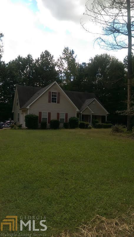 Ranch home with bonus attic rooms upstairs.