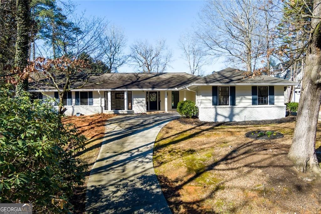 Photo of 7330 Hunters Branch Drive NE, Atlanta, GA 30328 (MLS # 10714700)