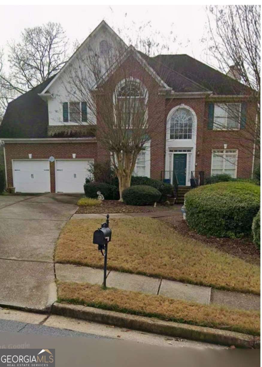 Photo of 4817 Cedar Wood Drive SW, Lilburn, GA 30047 (MLS # 10839126)