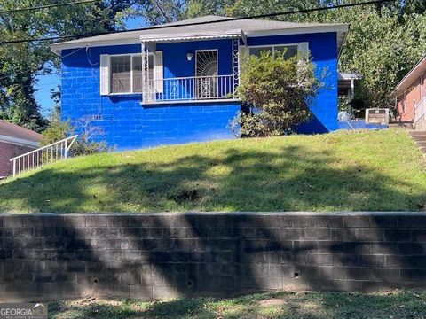 Photo of 56 Gardenia Drive NW, Atlanta, GA 30314 (MLS # 10623839) Photo of 56 Gardenia Drive NW, Atlanta, GA 30314 (MLS # 10623839)