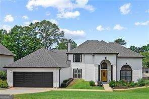 Don't miss this beautifully updated home with private Master Suite on the main! Updates include: new roof, new quartz countertop kitchen island, new interior and exterior paint, new water heater, new carpet throughout, new Pella windows on the main level, new light fixtures and fans throughout, new Zoysia sod front and back, new landscape irrigation and exterior lighting, new outdoor gutters, high speed ATT 5G Fiber Optic Internet, and much, much, more! Main level living features two-story great room, dining room, spacious gourmet kitchen overlooking the family room with a cozy gas fireplace and built-in wet bar, all complimented by large and abundant windows that provide amazing natural sunlight throughout these various spaces. Walk out to the extended back deck with new deck cover, completely fenced yard, beautiful landscaping, and year-round sunset views - the perfect place for outdoor entertainment. Upstairs features a roomy loft, dual vanity shower/tub bathroom, four bedrooms that allows for the flexibility for home office space(s), guest quarters, a workout room, and/or kid's playroom, man-cave,or hobby room. Choices, choices, choices! All of this located on a quiet Cul-de-sac in an area with top-tier schools, easy access to GA400/141, Shopping, Restaurants, and only 5 miles from Big Creek Greenway. Tenant has access to Neighborhood Amenities, which include Pool, Tennis Court(s), Playground, and Clubhouse. Washer, Dryer, Refrigerator/Freezer included. Owner will arrange lawn/landscape care.