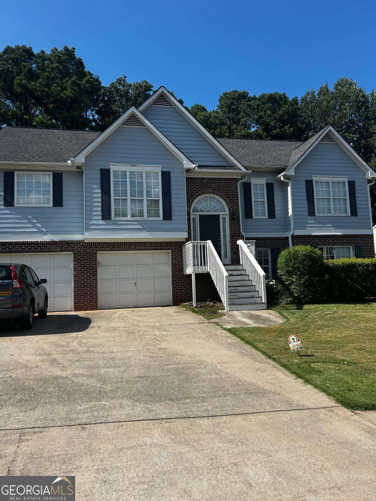 Welcome to this beautifully maintained split level home in the Centennial Place Community. This home offers exceptional schools, access to I575, shopping, restaurants and is minutes from downtown Woodstock. The main floor of this split-level home offers a private entrance, three bedrooms, two baths, a one-car garage and private deck. Gas, electricity and water are included in this rental. Swimming, tennis and playground included.