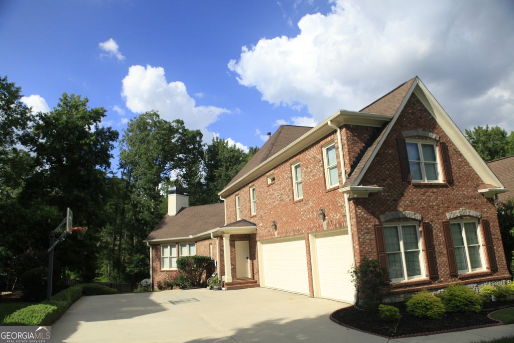 Photo of 2201 Hunters Green Drive, Lawrenceville, GA 30043 (MLS # 10812595)