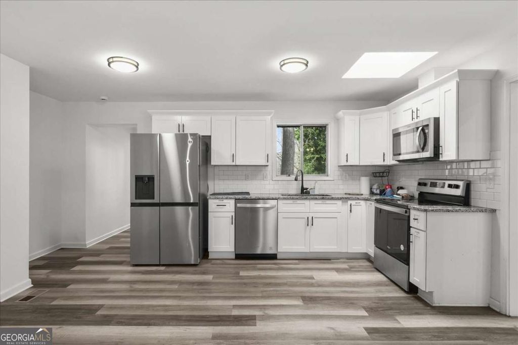 Photo of 3145 Flat Shoals Rd, Atlanta, GA 30349 (MLS # 10690524)