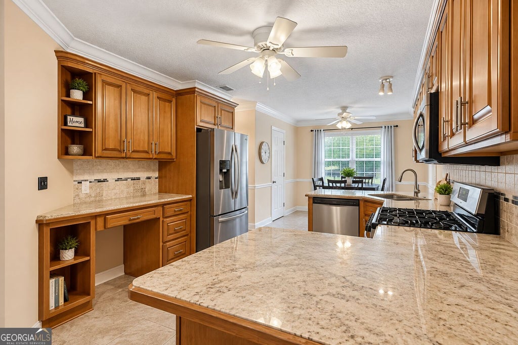 Photo of 740 Pebble Boulevard, Covington, GA 30016 (MLS # 10846181)