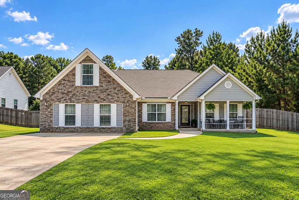Photo of 740 Pebble Boulevard, Covington, GA 30016 (MLS # 10846181)