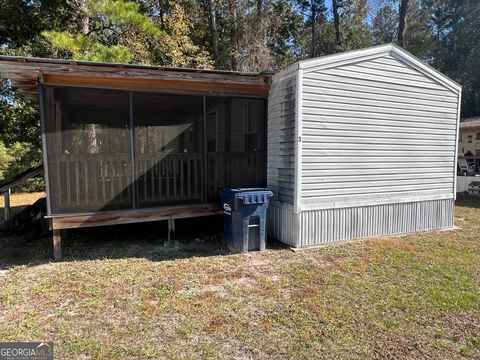 Photo of 727 W 3rd St #LOT 3, Woodbine, GA 31569 (MLS # 10649137)