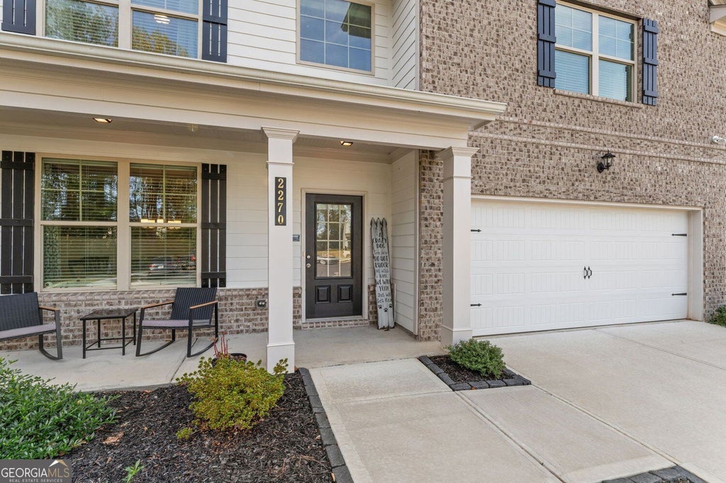 Photo of 2270 Highridge Point Drive, Lithia Springs, GA 30122 (MLS # 10880497)