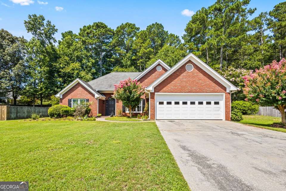 Welcome to this beautifully updated ranch-style home with a versatile loft area, located in Walton County within the desirable Walton County School District! Boasting modern touches throughout-including updated countertops, sleek new flooring, and stainless steel appliances-this residence offers a stylish, open-concept floor plan that's perfect for both everyday living and entertaining. Situated on a spacious, private lot with a fenced backyard and dedicated play area, the property is ideal for families, kids, and pets. Enjoy easy access to local shops and grocery stores in nearby Walton County communities like Loganville and Monroe, placing everyday conveniences just minutes from home. The home is offered as-is, providing a fantastic opportunity to purchase in one of Walton County's prime school zones and highly desirable neighborhoods.