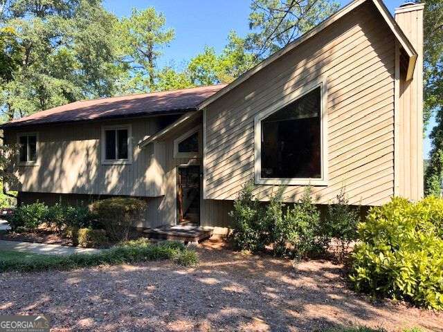 LOCATION LOCATION LOCATION in award-winning Cobb School District! Due West, McClure and Harrison. Property will be available Oct 20, 2025 and has lots of space, including: 4 bedrooms, 2-1/2 bathrooms, a beautiful kitchen, dining area, great room with stone fireplace, terrace-level family room and screened-in porch. This is a nice clean home with nearly-new paint, on a great lot in sought-after close-in, commuter-friendly Due West community subdivision. Great for work, live and play! Near restaurants, shopping (including The Avenues of West Cobb), gyms, and parks. Includes two-car garage plus a carport and storage unit. Even better, this home is owner-managed!