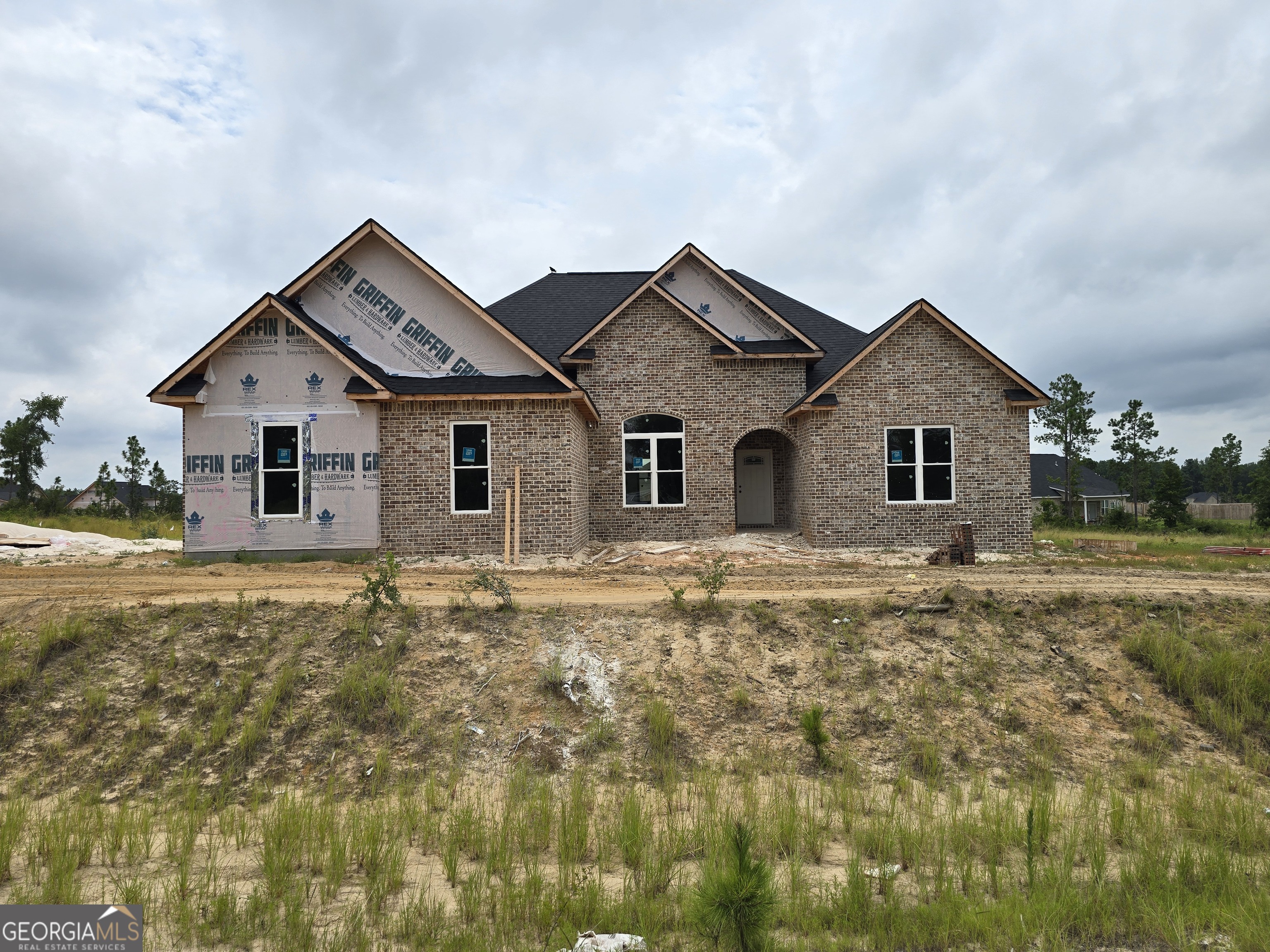 Beautiful New Construction Home - Perfectly Located Between Warner Robins & Macon! Welcome to this stunning 1-story, 4-bedroom, 2.5-bath new construction home offering 2125 sq ft of thoughtfully designed living space. Nestled in a prime location between Warner Robins and Macon, this home combines style, comfort, and convenience. Step inside to find luxury vinyl plank (LVP) flooring throughout the main common areas, plush carpeting in the bedrooms for cozy comfort, and durable tile in all wet areas for easy maintenance. The heart of the home is a spacious kitchen featuring stainless steel appliances, a large island, and a cozy breakfast area, ideal for morning coffee or casual meals. The split floorplan offers privacy and functionality, with the primary suite conveniently located on the main level, complete with a well-appointed en-suite bath. You'll find three additional bedrooms and a full bath-perfect for family, guests, or a home office setup. With its modern finishes, open layout, and unbeatable location, this home offers the perfect blend of suburban tranquility and city access. Don't miss your opportunity to make this beautiful space your own!