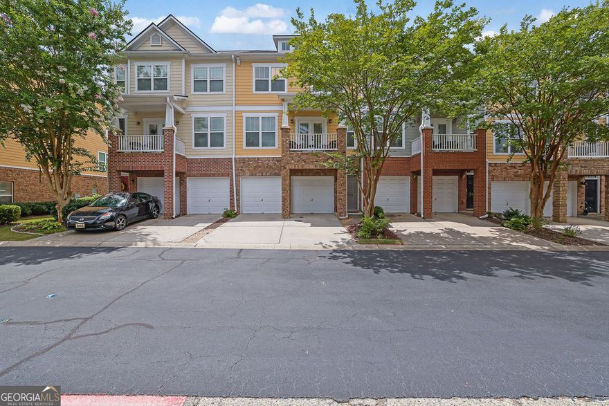 Welcome to this beautifully maintained and spacious 3-level townhome featuring 3 bedrooms, 3.5 bathrooms, a two-car garage, and multiple outdoor living spaces!    Enjoy a large open floor plan with new hardwood floors and stairs throughout, a cozy fireplace in the main living area, and abundant natural light that creates an inviting atmosphere throughout the home.    The modern kitchen boasts granite countertops, including an oversized extended island, stainless steel appliances, and plenty of storage - perfect for everyday living and entertaining. The open layout flows seamlessly into the dining and living spaces.    Step outside to enjoy three well-maintained decks:    A private lower-level deck with enclosed backyard access  A charming front deck above the main entryway  A newly extended rear deck on the main level - ideal for relaxing or entertaining  All bedrooms are spacious, and the primary suite includes an upgraded custom closet system. With three full bathrooms and a convenient half bath, there's room for everyone.    The home also features a two-car garage and is situated in a well-kept community with easy access to nearby amenities.    Don't miss this opportunity to own a stylish, move-in-ready home with space, upgrades, and versatile outdoor living!