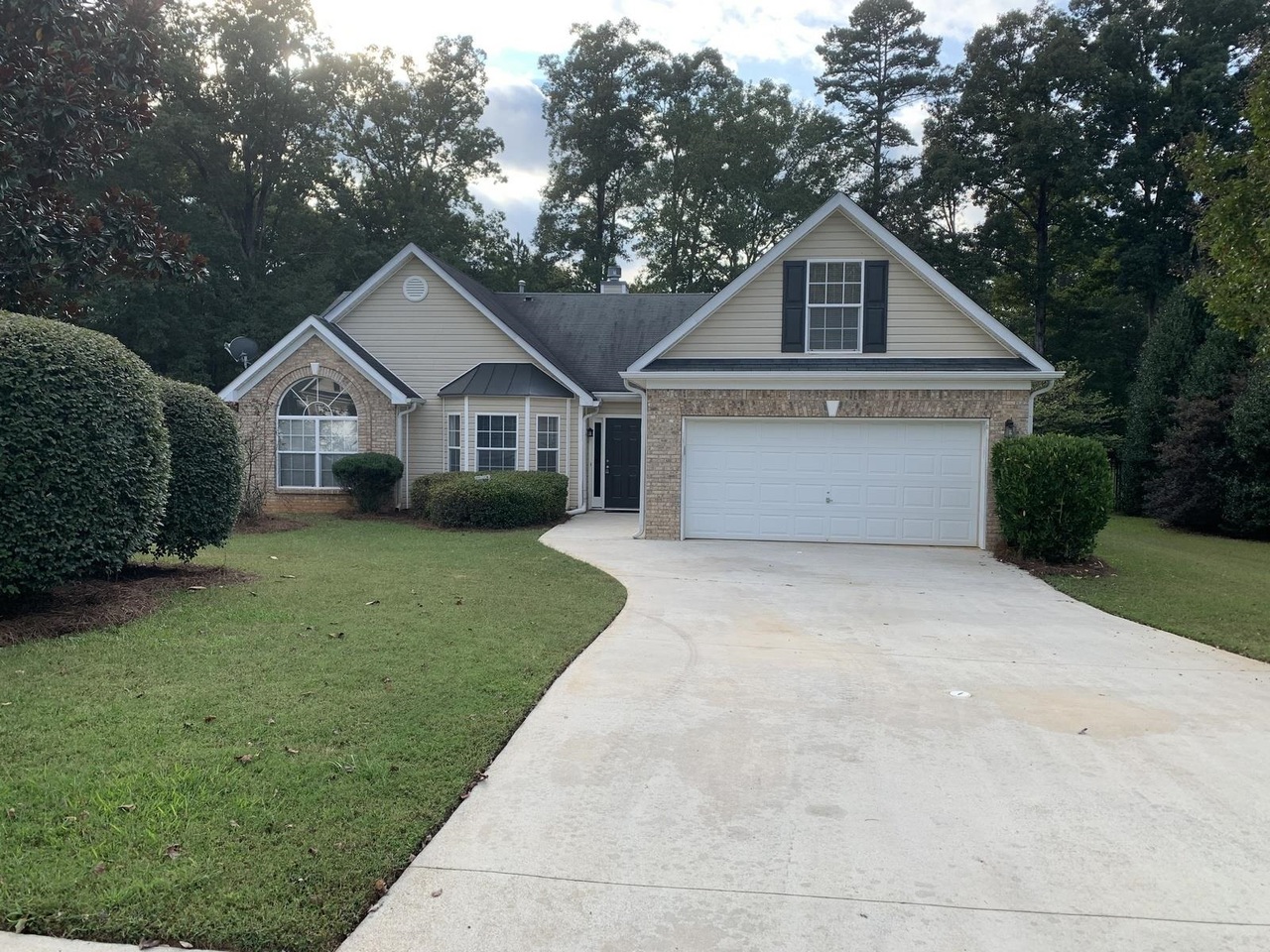 This well-maintained 3-bedroom, 2-bath ranch offers a spacious layout and a great location which is just minutes from I-20, shopping, dining, and entertainment. The home features a soaring ceiling in the family room with a cozy corner fireplace, creating a warm and open living space. The kitchen is equipped with stainless steel appliances and a bright breakfast room, while the formal dining room provides the perfect setting for entertaining. The oversized master bedroom includes a walk-in closet and a private bath with a dual vanity, garden tub, and separate shower. Two large guest bedrooms, a full hall bath, a office/sunroom area and a versatile bonus room offer plenty of space for family, guests, or a work from home environment. Additional highlights include a laundry closet, 2-car garage, back patio, and a huge backyard with endless potential for outdoor enjoyment. Move in Ready with LVP flooring in main living areas, like new carpet in bedrooms / bonus and freshly painted.