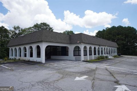 Photo of 2141 Flat Shoals Road SE, Conyers, GA 30013 (MLS # 10651146)