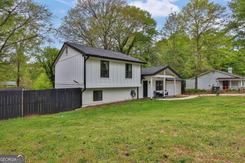 Photo of 447 Warren Rd, Lawrenceville, GA 30044 (MLS # 10729785)