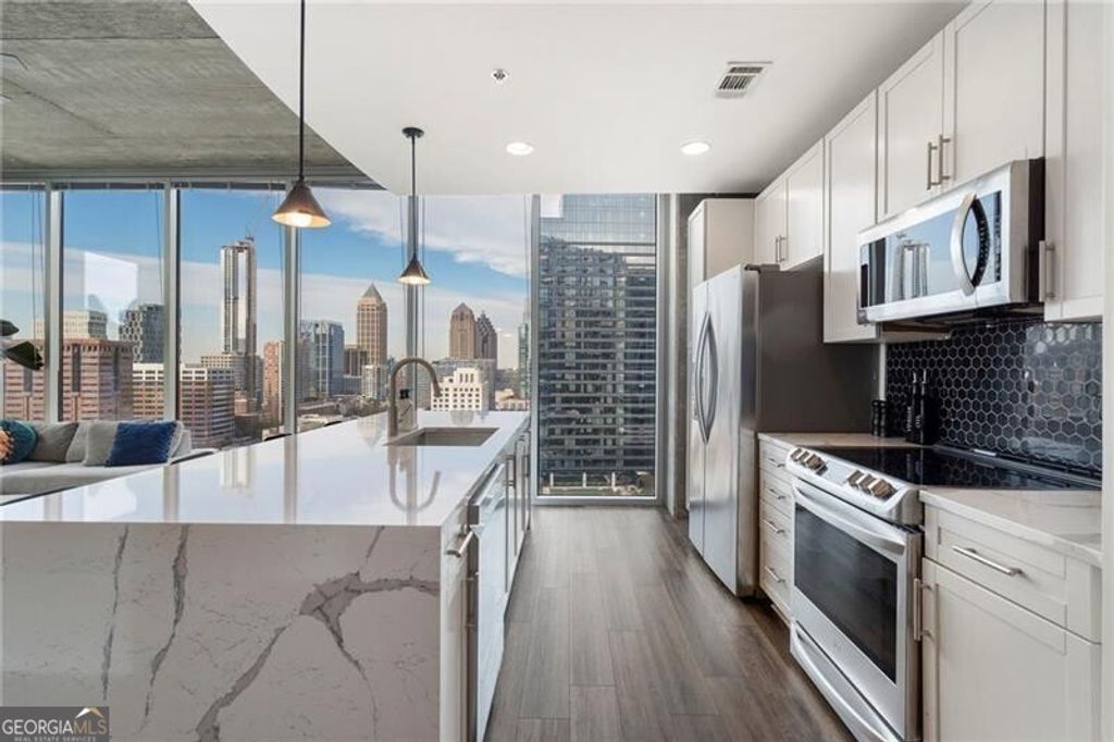 Photo of 855 Peachtree Street NE #1702, Atlanta, GA 30308 (MLS # 10656711)