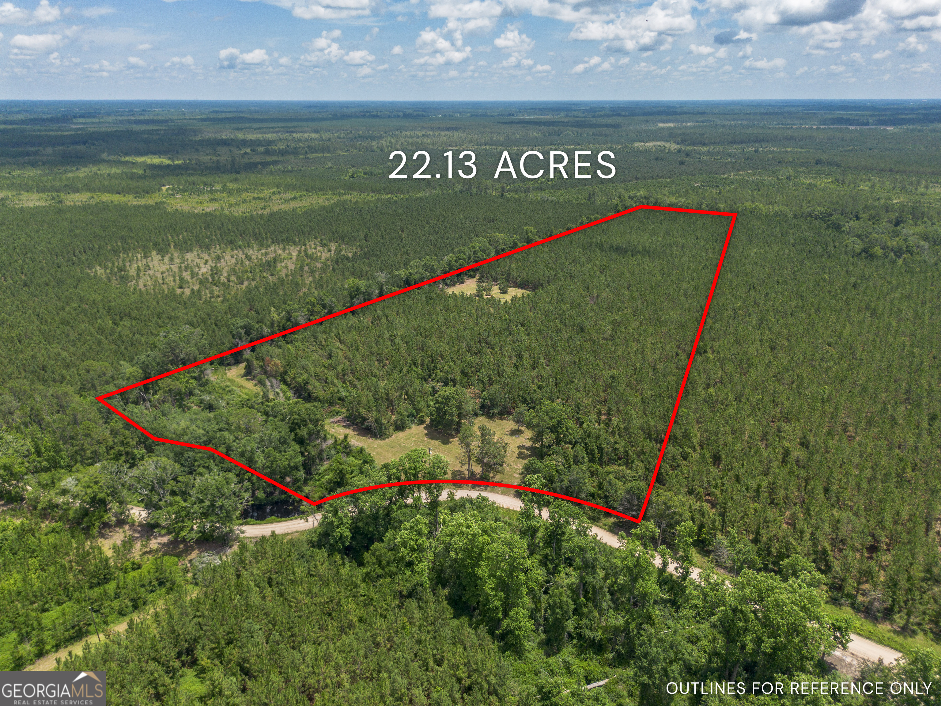 Located on Oriole Road in Alma, Georgia, this 22.13-acre property is already set up and ready for your homesite-or homesites. With two septic tanks, a well, power, and high-speed internet already in place, it's a rare find for anyone looking to build without starting from scratch. The land is mostly planted in pine, offering both privacy and the feel of being tucked away, while still having modern conveniences. Whether you're planning to build your dream home, bring in multiple family homes, or create a weekend retreat, this property has the infrastructure and the seclusion to make it happen.