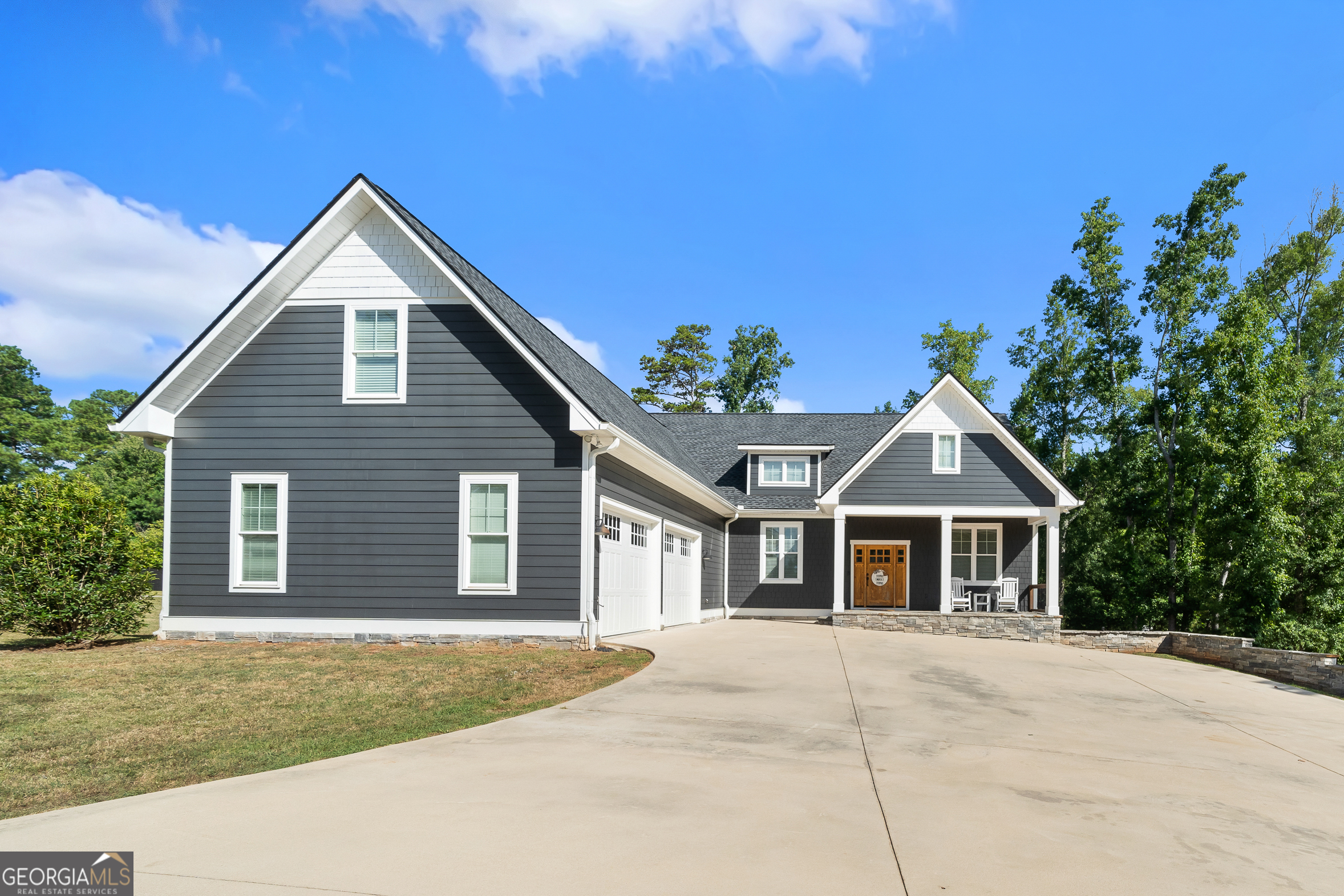 410 High Bluff Ct | Milledgeville, GA | $799,000 This unique and spacious property offers flexibility, comfort, and incredible amenities - perfect for multi-generational living, entertaining, or simply enjoying the good life! The main level features 3 bedrooms, 2.5 bathrooms, a bright and open living area, and a flex/bonus room ideal for a home office, playroom, or guest space. The kitchen comes complete with appliances included, making it move-in ready. The downstairs level offers even more space with 2 additional bedrooms, 1 full bathroom, a living room, and laundry hookups-great for a guest suite or private apartment setup. There's also a workshop with roll-up door for your hobbies, storage, or business needs. Enjoy outdoor living on the back deck overlooking your private pool, and take advantage of the 2-car garage and 2-year-old roof for added peace of mind. This home has it all - space, convenience, and charm - all nestled in a Dovefield Subdivision! Schedule your private showing today!