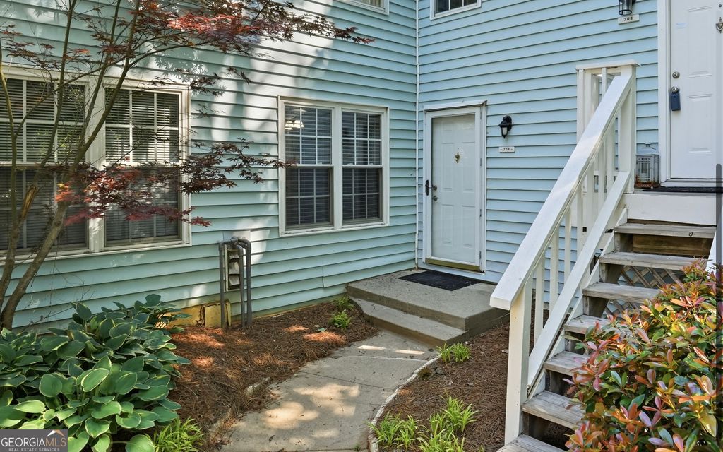 Photo of 704 Glenleaf Drive, Peachtree Corners, GA 30092 (MLS # 10762093)