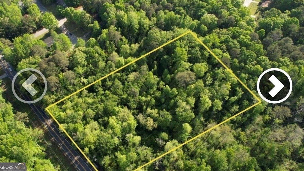 Photo of 2069 Ebenezer Rd SW, Conyers, GA 30094 (MLS # 10851251)
