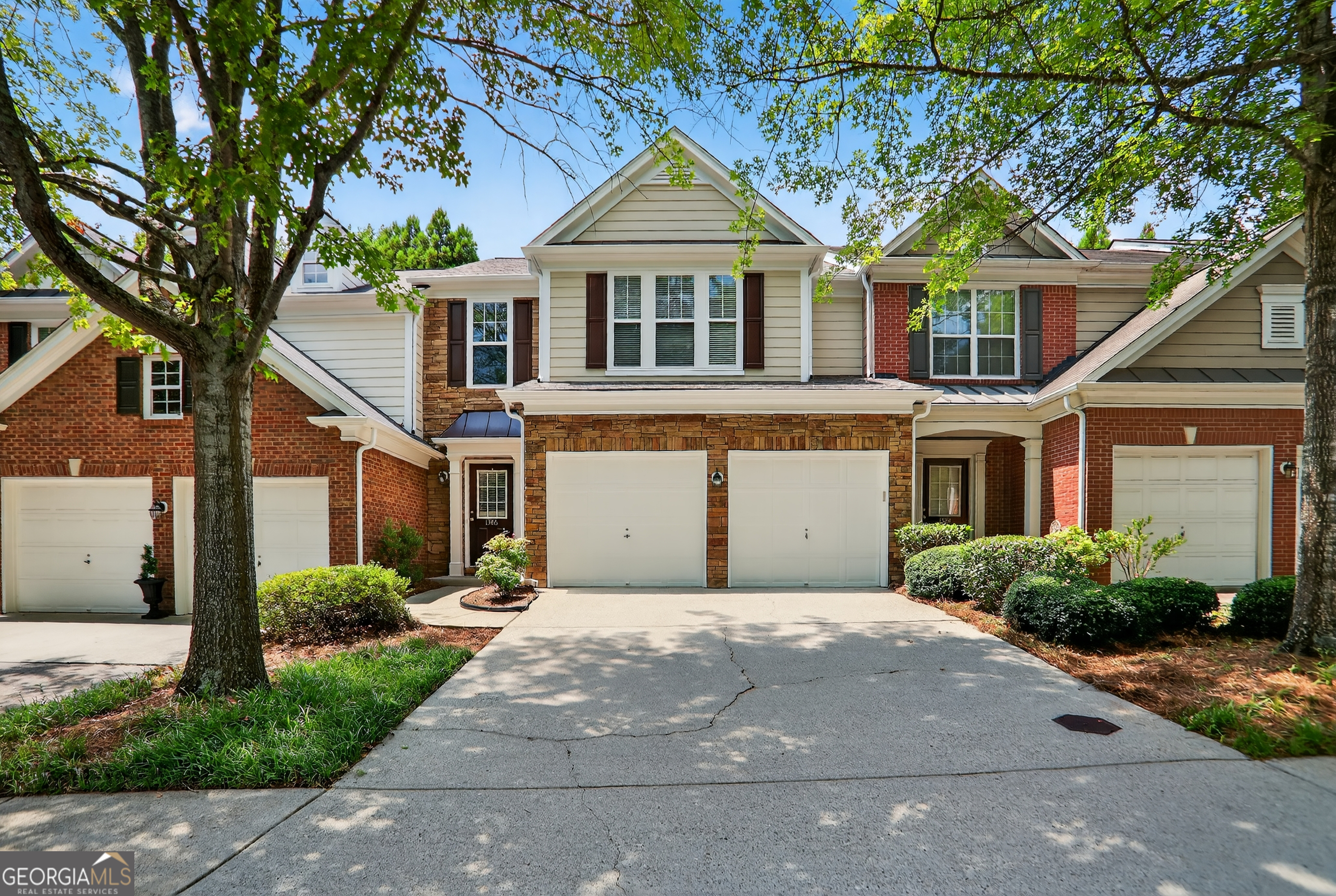 Beautiful New Listing in the Prime Roswell/Alpharetta Area! Private Gated Community! Enjoy Cooling off in Your Relaxing Neighborhood Pool! Gentle sidewalks throughout the community! Gracious 3 Bedroom 2.5 Bath Home! Move-in Townhome with New Engineered Hardwood Floors on the Main Level! New Roof in 2023! New High Efficiency Air Conditioning System installed in 2025! HOA covers the Water, Lawn Maintenance, and Trash Pick-up. Beautiful Townhome Built by Pulte in the Highly desirable Milton High School district! Close to Innovation Academy! This home comes with a Spacious Owner's Suite with Walk-in Closet! Ample 2 Car Garage! Separate Laundry Room on 2nd Level! Oversized Restful Private Back Patio. Ultra Convenient to Wills Park, Downtown Alpharetta, and Avalon! Easy access to GA 400! Easy Commute Location! Carefree Living at its Best! Neutral Decor! One of the Top Places to Live in all of Atlanta! Affordable! Much, Much, More!!!