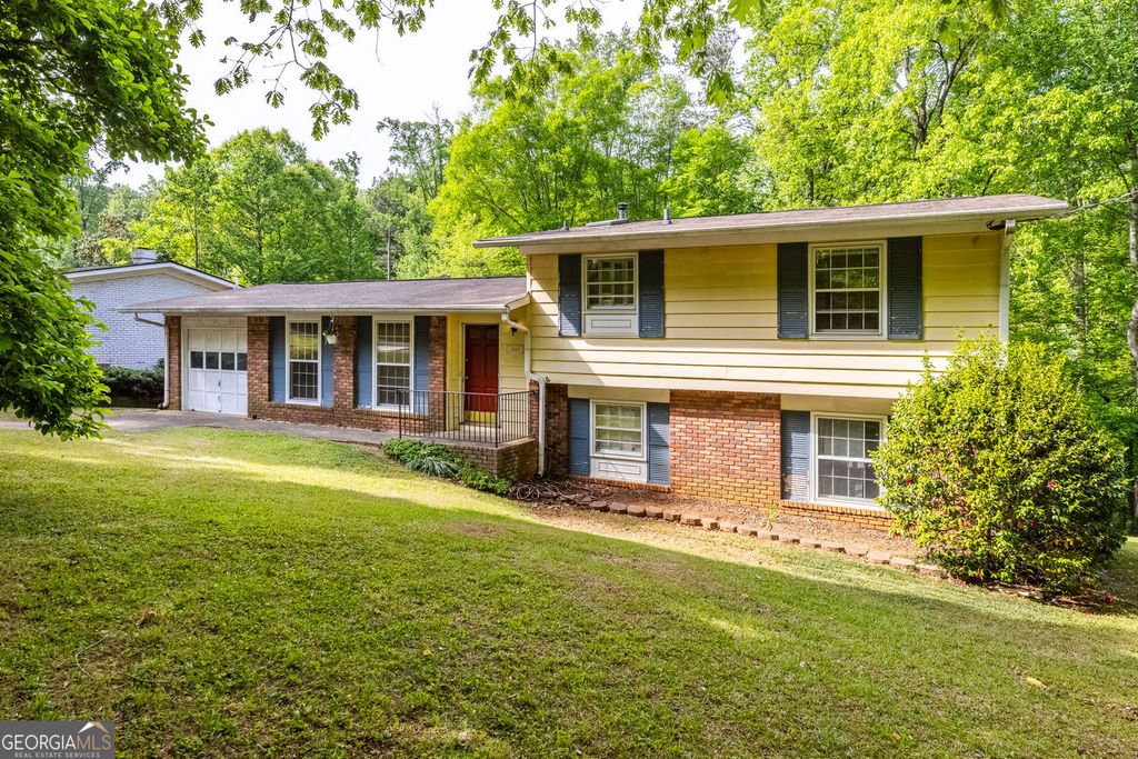 Photo of 1569 Bubbling Creek Road NE, Brookhaven, GA 30319 (MLS # 10741133)