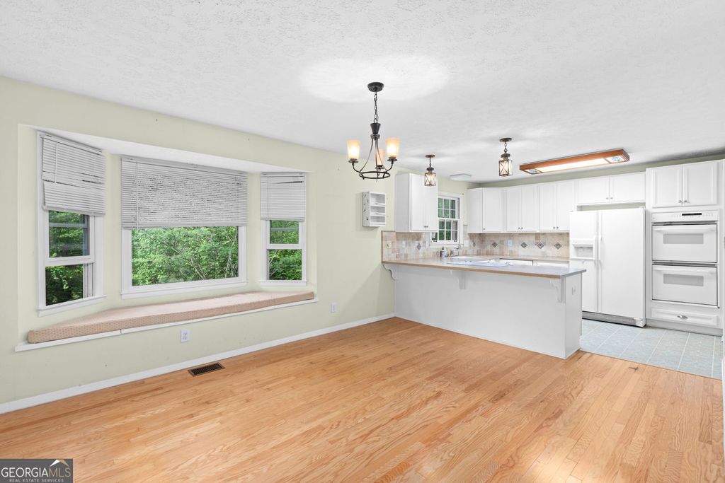 Photo of 1569 Bubbling Creek Road NE, Brookhaven, GA 30319 (MLS # 10741133)