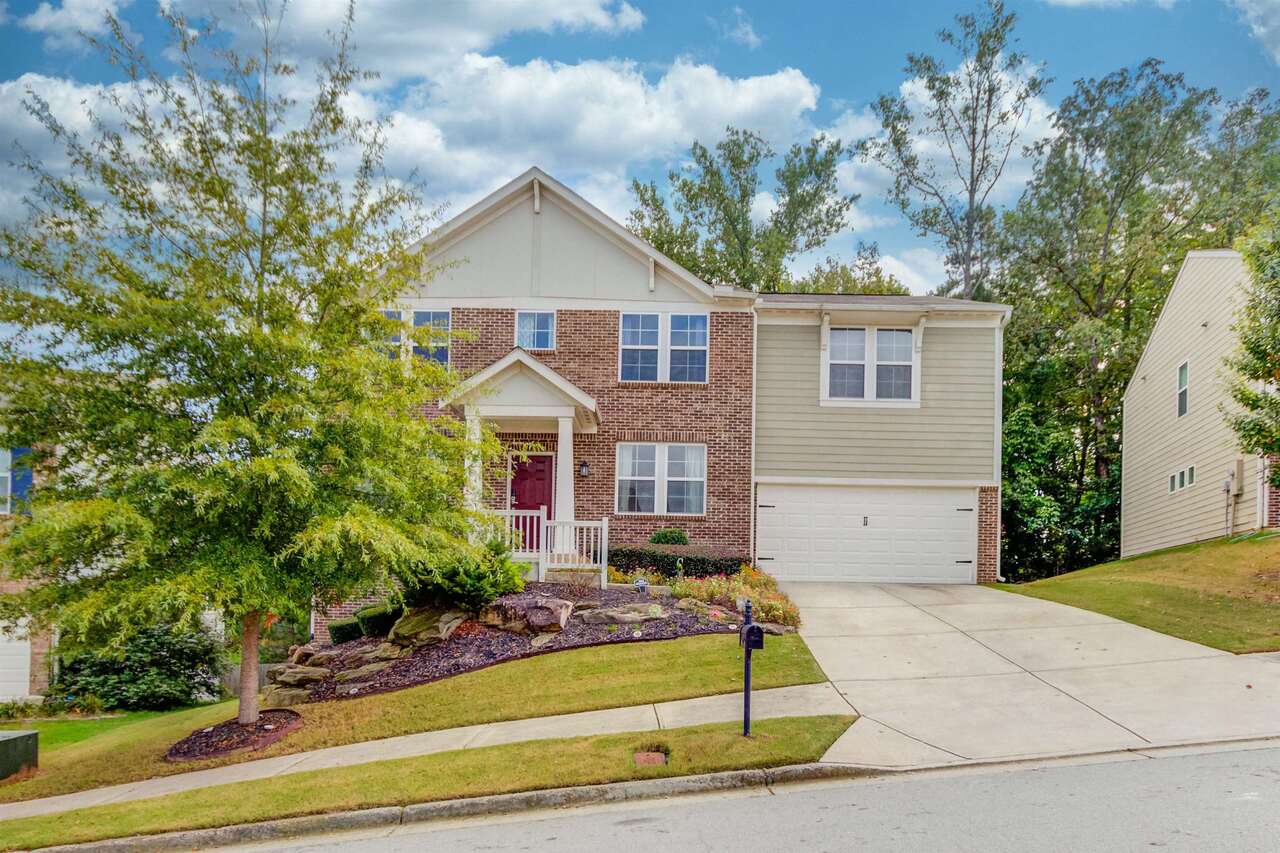 Charming 5 bed, 3.5 bath home in Lanier High School District. The main level features an open kitchen and family room, half bath, formal living room and a formal dining room. Upstairs features new carpet, a loft area, owner’s suite with his/hers sinks, separate shower, soaking tub, and large walk-in closet. 3 secondary bedrooms and full bath also on the upper level. The lower level features a finished basement, secondary bedroom and full bath (basement sf not reflected in tax records). Outside features a fenced in backyard with a deck just off the kitchen. Great location & schools!!