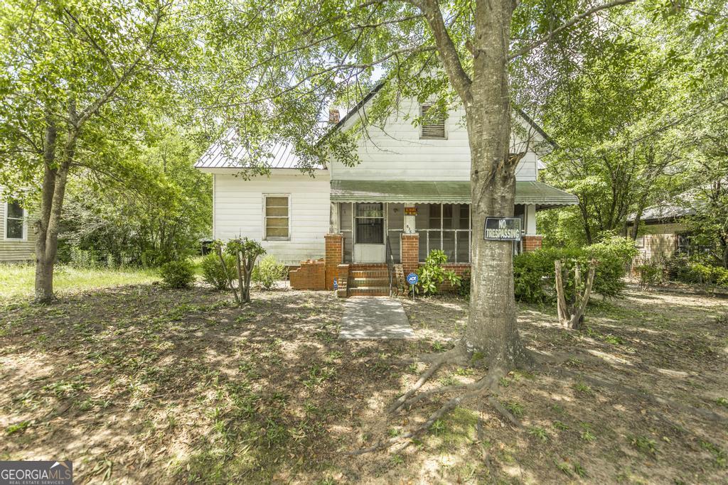 Opportunity Awaits! This 3 bedroom, 2 bath home is full of potential and ready for an adventurous flipper or a visionary family not afraid of a project. It features a huge backyard-perfect for gatherings, gardening, or future additions. Priced to sell, this is the ideal canvas for someone ready to bring their ideas to life without breaking the bank. Located just a short drive from downtown Macon's vibrant and busy district, this property combines convenience with possibility. Don't miss the chance to turn this diamond in the rough into a true gem!