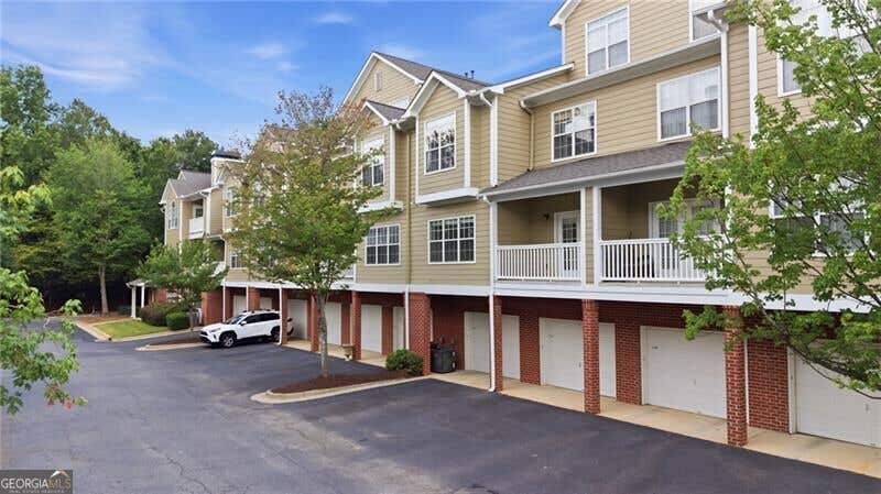 Photo of 5110 Woodland Lane, Alpharetta, GA 30009 (MLS # 10823030)