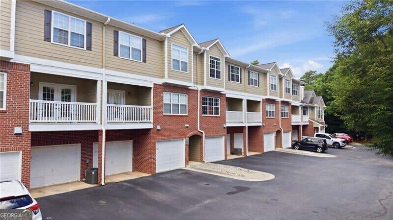 Photo of 5110 Woodland Lane, Alpharetta, GA 30009 (MLS # 10823030)