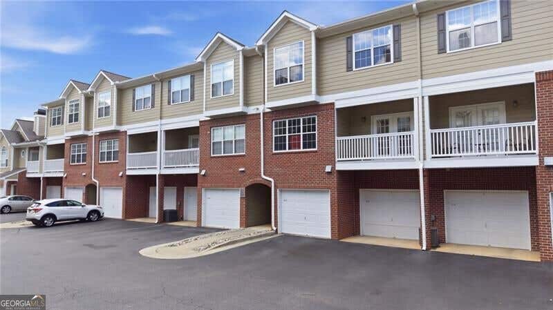Photo of 5110 Woodland Lane, Alpharetta, GA 30009 (MLS # 10823030)