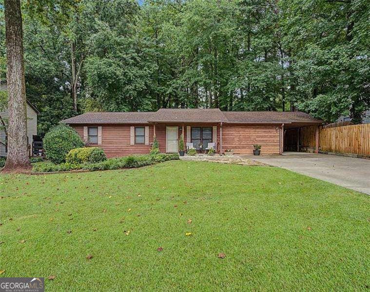 Photo of 3095 Woodland Drive NW, Kennesaw, GA 30152 (MLS # 10834040)