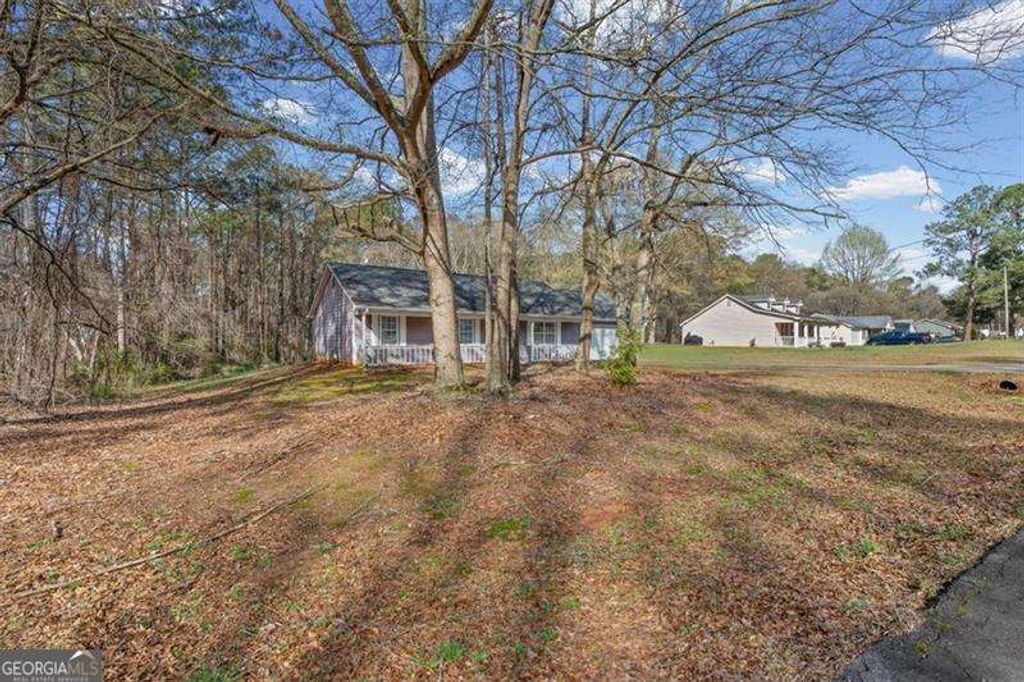 Photo of 120 Woodcrest Drive, Covington, GA 30016 (MLS # 10757852)