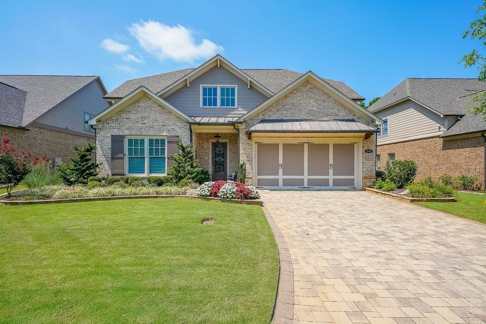 Welcome Home! This First Class Retirement Haven is peacefully situated in an Exclusive Gated Active Adult Community of only 40 homes! You'll love the beautiful brick paver driveway, stoned pathways and stunning landscaping. Shows like new! As you step inside the inviting entryway, you will be greeted by an Expansive, Open layout with tons of natural light- perfect for entertaining in uncrowded comfort! This house designer' and will reflect the personality and taste of those accustomed to the best in quality design, finishes and lifestyle. Upgrades Galore! The gourmet island kitchen will inspire your inner chef and has enough room for several chefs at the same time- complete with stunning stone counters, SS appliances, tile backsplash, breakfast bar and walk-in pantry. Sit back and relax in the spacious fireside great room graced with beautiful built-ins, coffered ceilings and an open view to the kitchen. The formal dining room with tons of natural light will be the place you will gather with friends and family to make those wonderful memories. Escape to the dreamy master retreat on main to envy boasting lovely tray ceilings and a large Custom Walk-in closet. Luxurious master bath with frameless tiled shower and dual vanities. All the secondary bedrooms are generously sized with large closet, providing privacy for guests or plenty of room for family sleep and play. The gigantic loft space upstairs provides great flex space options for a media room, office or even a playroom. Enjoy those peaceful mornings on the lovely glass enclosed patio. With lawn maintenance handled by the HOA, you'll enjoy low maintenance living at its finest! With its warm sense of community and easy access to 400, this one-of-a-kind home provides all the elements for relaxing, comfortable and easycare living. Move in today and start making memories tomorrow!
