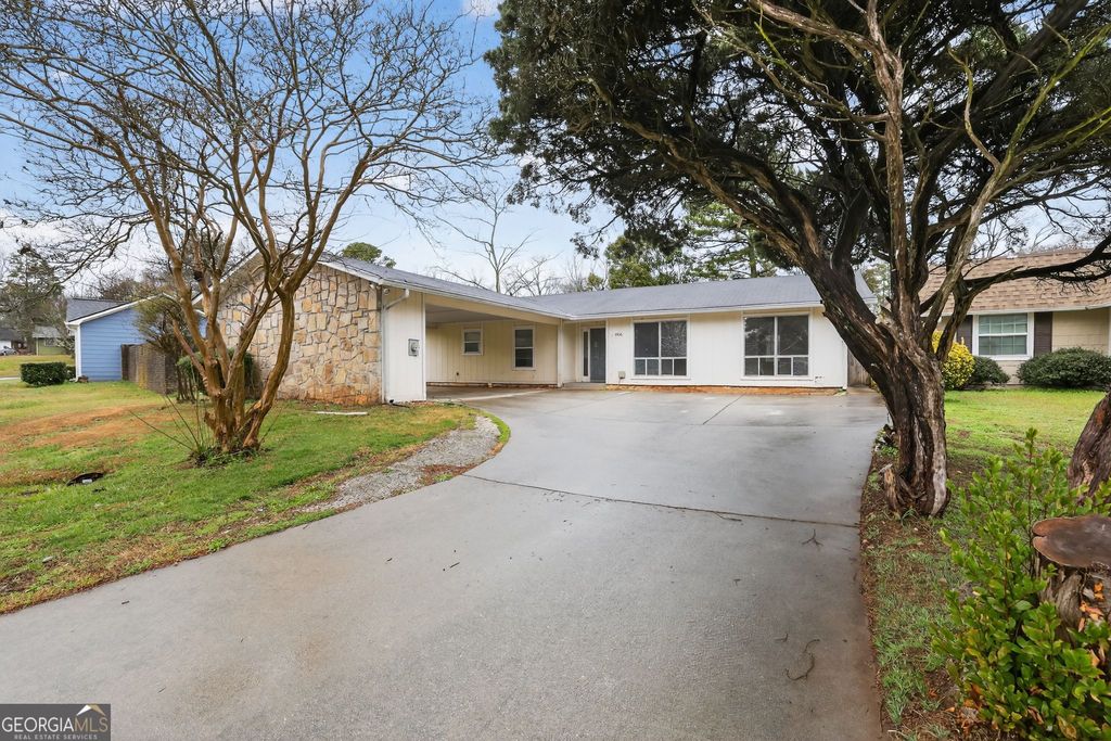 Photo of 4406 Carriage Trail, Stone Mountain, GA 30083 (MLS # 10702593)