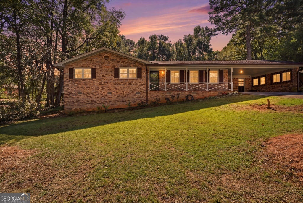 Photo of 4824 Rosewood Dr SW, Lilburn, GA 30047 (MLS # 10880705)