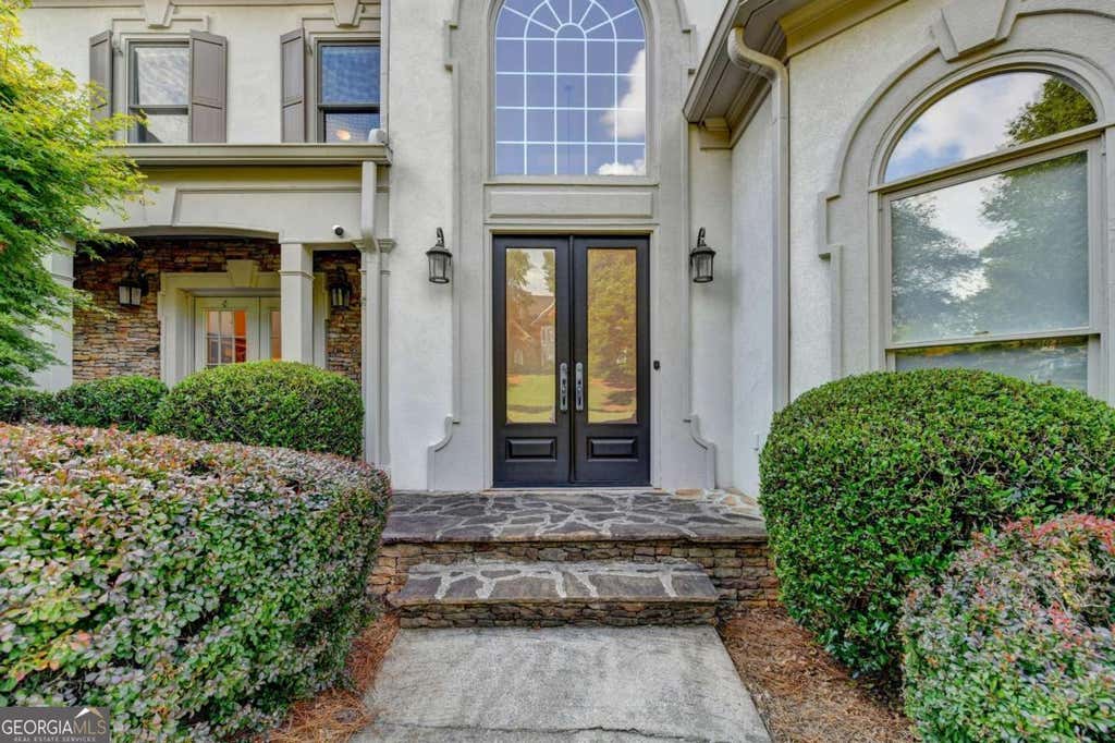 Photo of 5955 Ettington Drive, Suwanee, GA 30024 (MLS # 10784889)