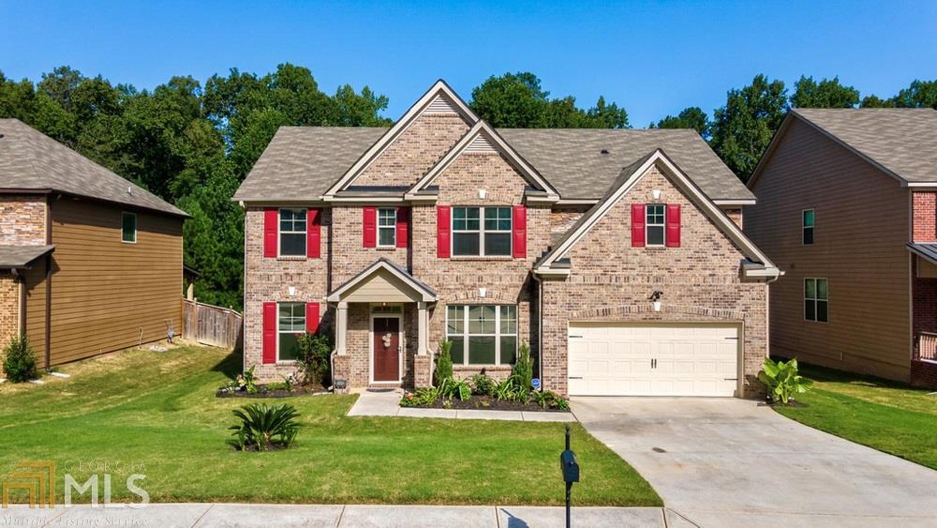 Location and upgrades throughout this stunning 5BR 4 bath home complete with the sought after private office should move it to the top of your list. A gourmet kitchen with upgraded SS appliances that include a gas cooktop, double ovens, microwave, dishwasher, & custom backsplash. The unique & luxurious layout will have everyone wanting to entertain in your new home. A full bowed wall on upper & main floors adds a lot of light and makes it feel like your special vacation home. The master bedroom is upstairs and prepared to be WOWed with the step-up feature perfect for separating sleep area or sitting/office space. Throw in other upgrades like wrought iron balusters, pendant lights, espresso cabinets, and beautiful hardwood floors, and its easy to see why this one is PickiVicki Approved! Don't wait because this one is priced to sell & you know it will go fast. OWNER OCCUPIED WITH ALARM NEED appt and CBS code to show.